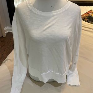 White long sleeve t with heart cutout on sleeve